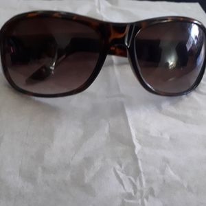 Gucci women's sunglasses.  Brown and gold.